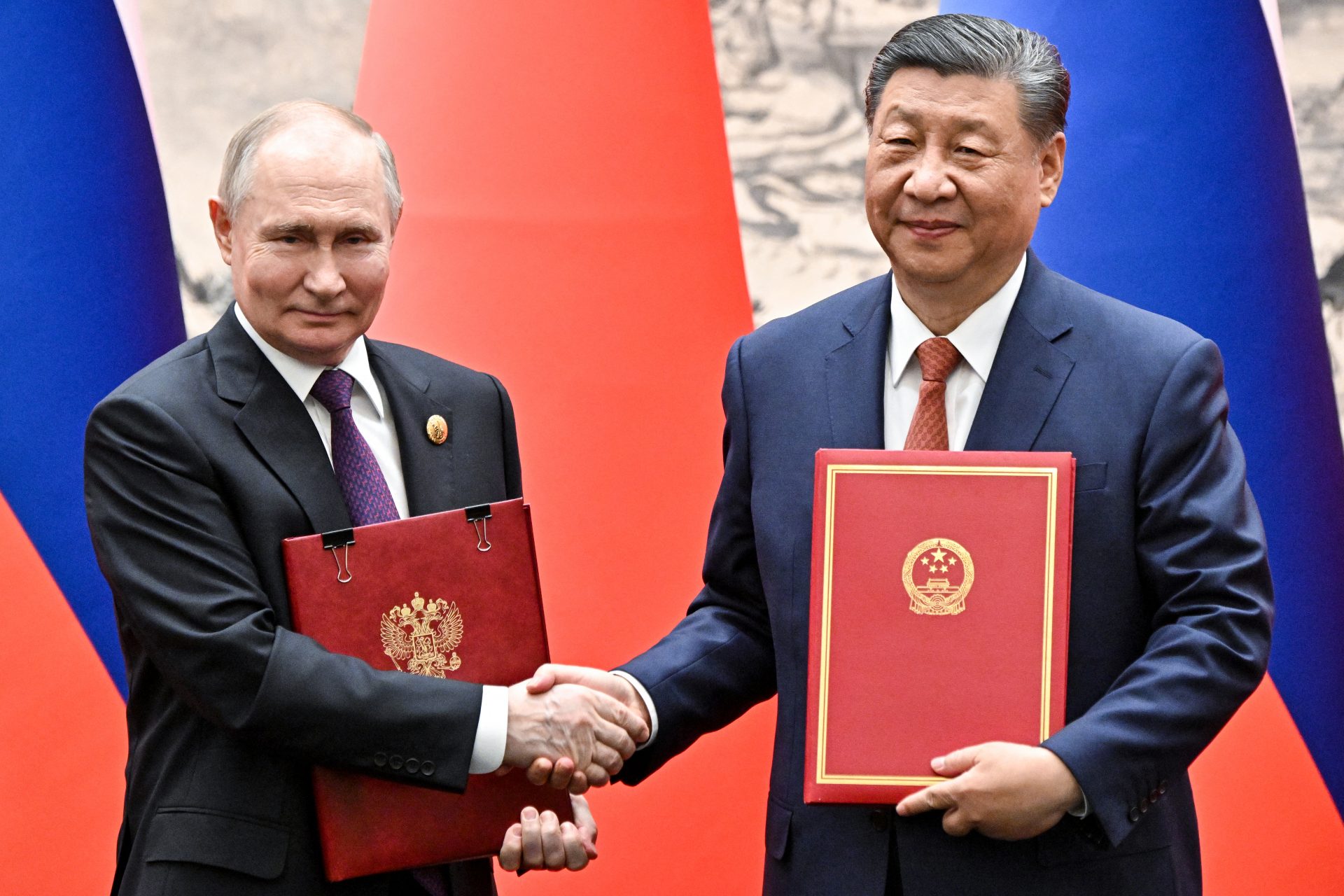 Putin and Xi reaffirm Russia-China friendship in a Beijing state visit