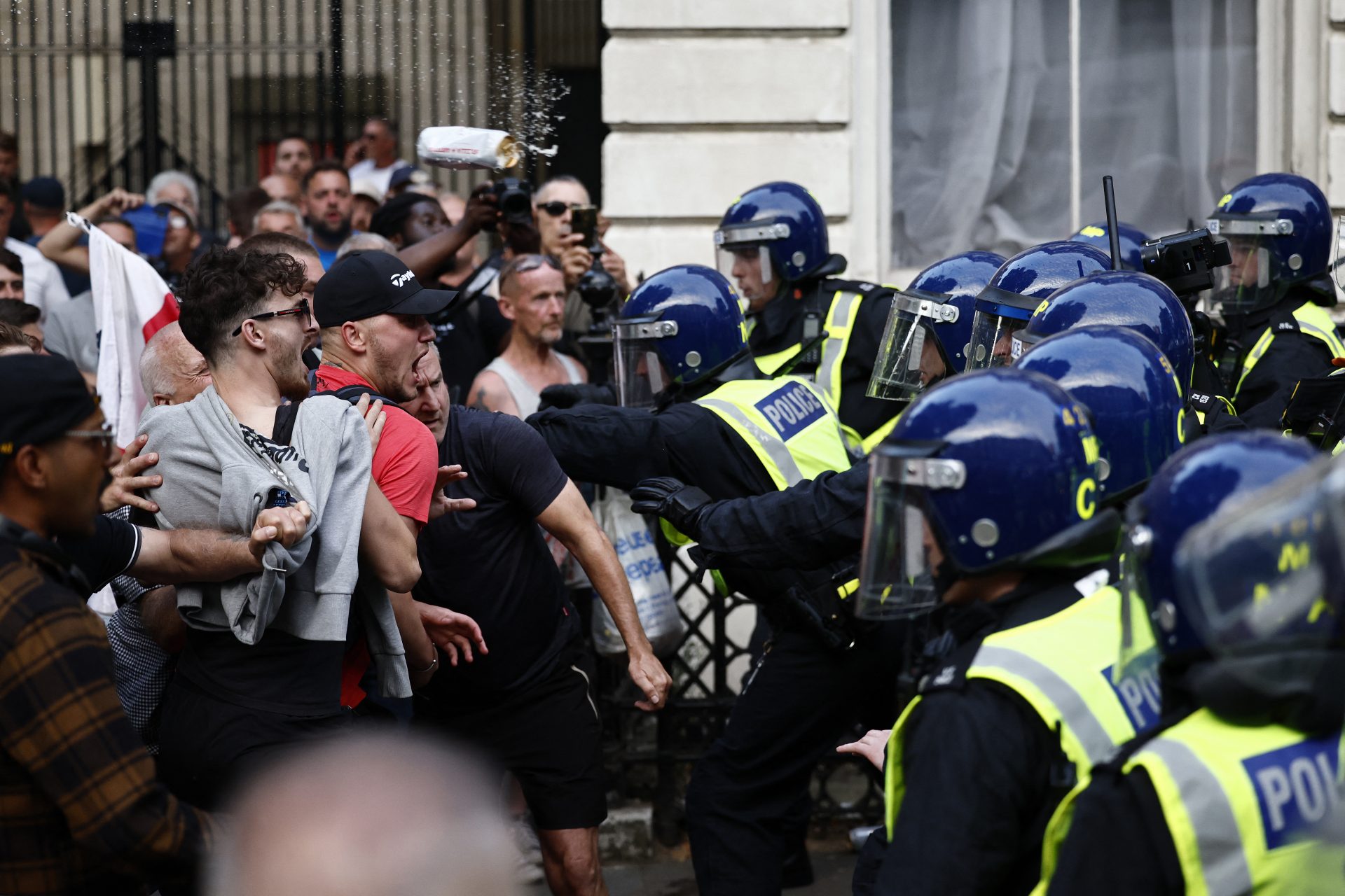 100 arrested in London