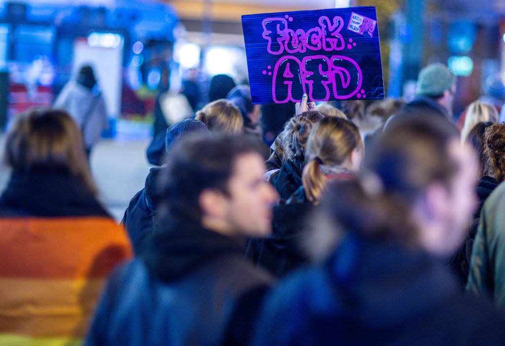 Der konservative Merz hält an einem offenem Deutschland fest 